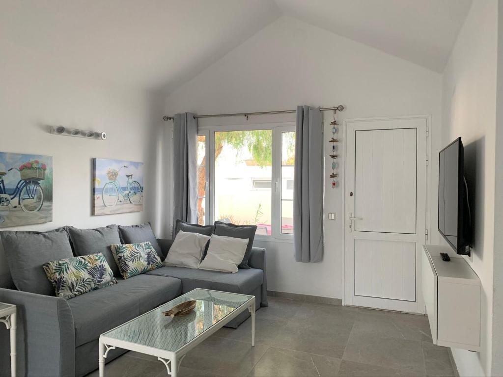A television and/or entertainment centre at Casa Acqua