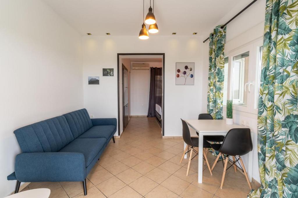 Posezení v ubytování Veranda 2-Guest Apartment