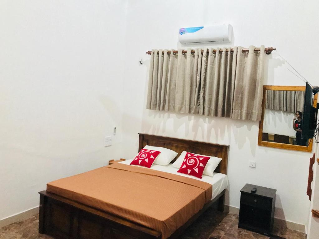 Postel nebo postele na pokoji v ubytování Ritigala Hideaway