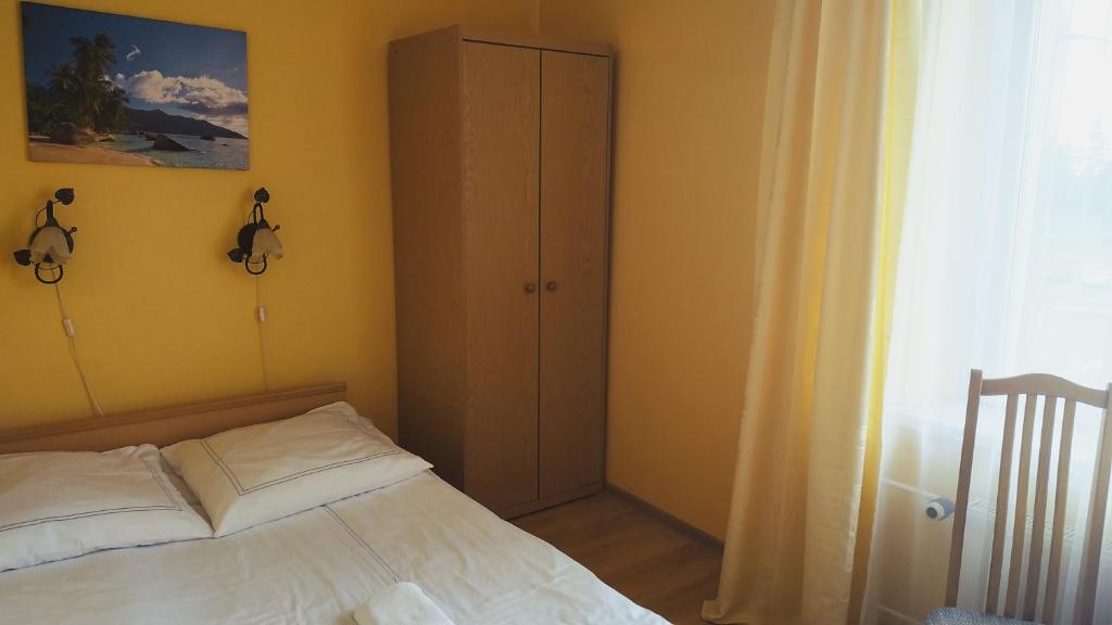 Posteľ alebo postele v izbe v ubytovaní Hotel Eden 24h