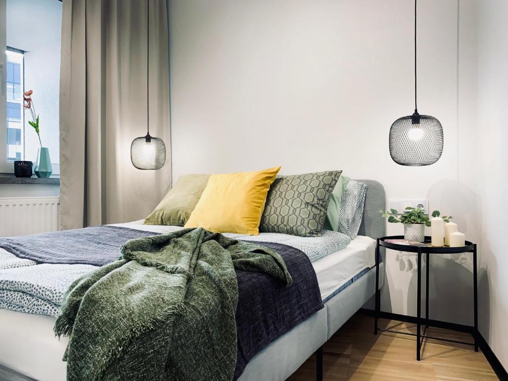 Cama o camas de una habitación en Apartment next to Cracow Eye, Vistula Boulevards