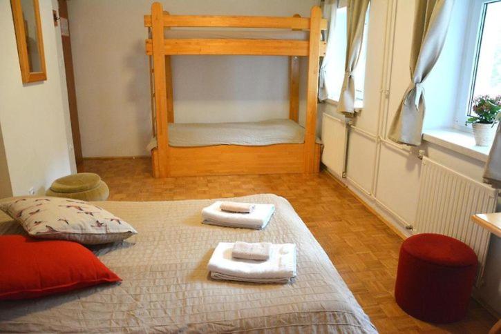 Postel nebo postele na pokoji v ubytování Rooms Barovc by the Lake Jasna