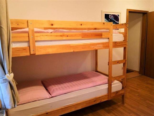 Postel nebo postele na pokoji v ubytování Rooms Barovc by the Lake Jasna
