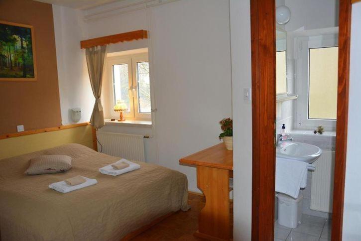 Postel nebo postele na pokoji v ubytování Rooms Barovc by the Lake Jasna