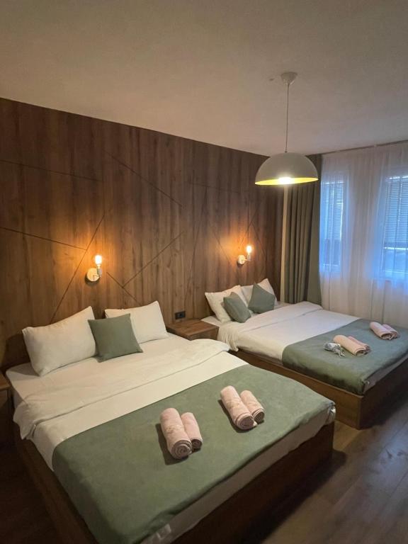 Postel nebo postele na pokoji v ubytování Villa Stefano