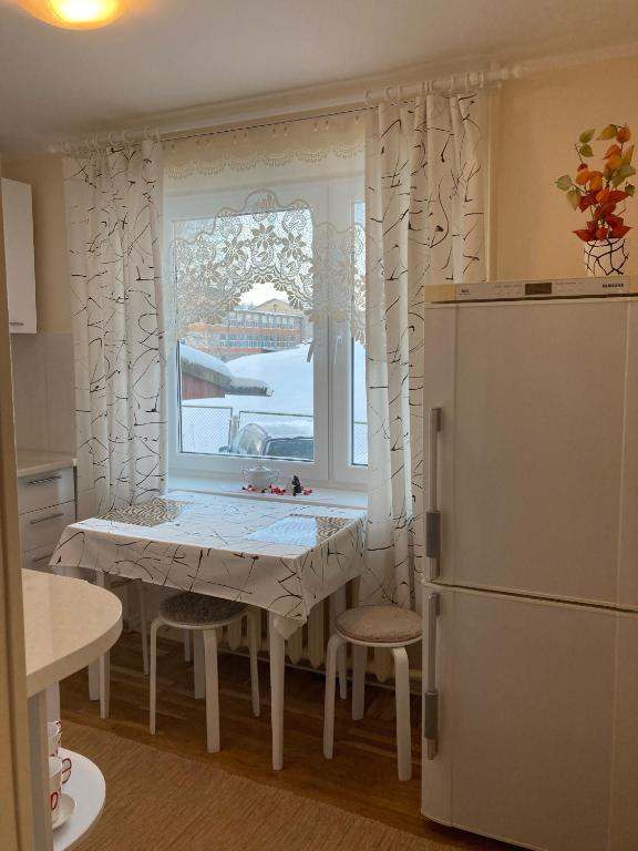 Kuchyň nebo kuchyňský kout v ubytování Helge Guest Apartment