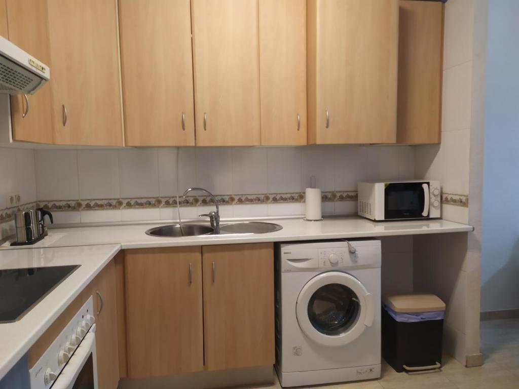 Kuchyňa alebo kuchynka v ubytovaní Apartamento Residencial Puerta Roquetas