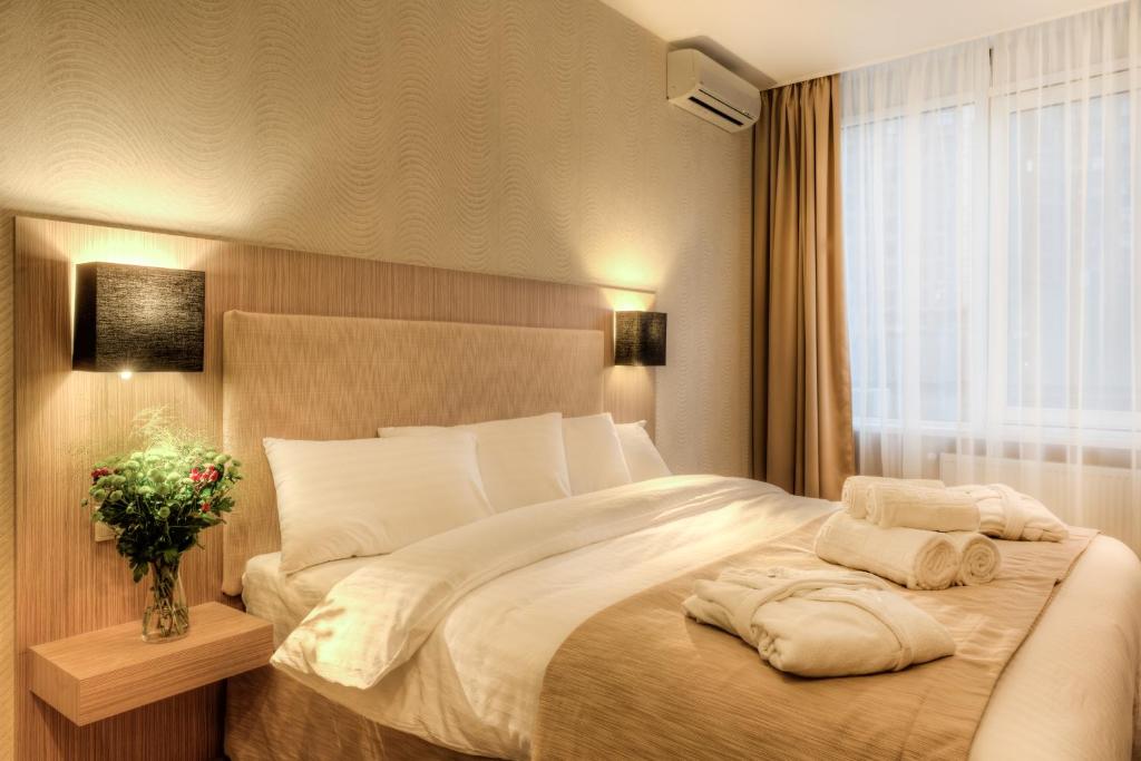 Postel nebo postele na pokoji v ubytování Bon Apart