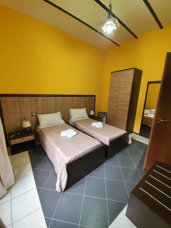 Postel nebo postele na pokoji v ubytování B&B 13