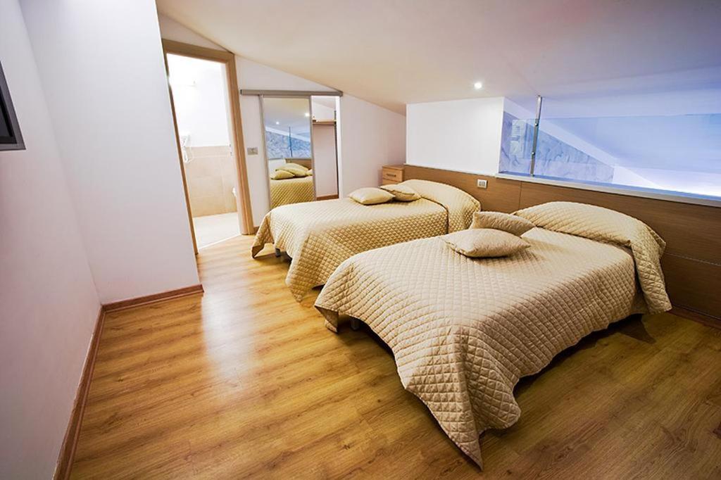 Postel nebo postele na pokoji v ubytování Le Onde Resort