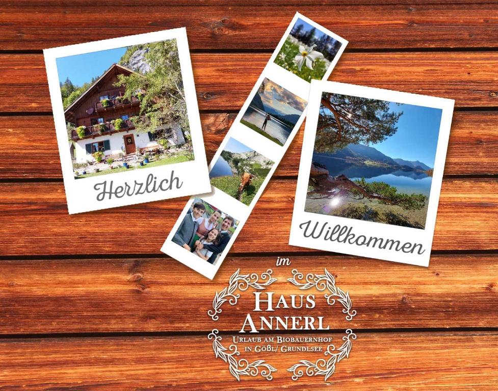 a collage of photos on a wooden table at Haus Annerl in Grundlsee