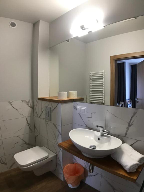 Kúpeľňa v ubytovaní Apartamenty Julia APARTAMENTY OZONOWANE