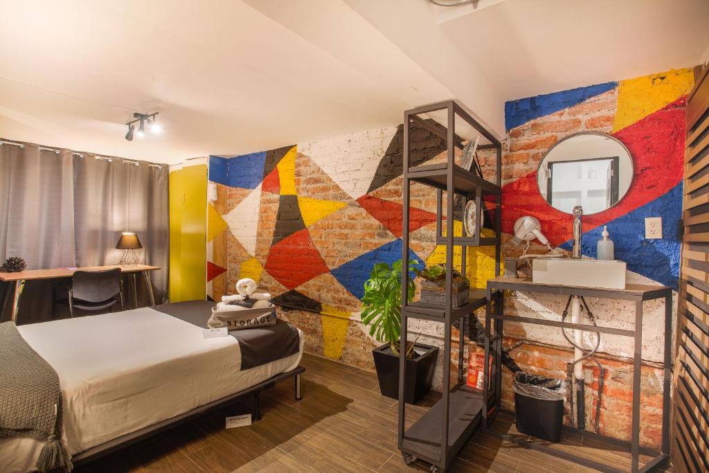 Postel nebo postele na pokoji v ubytování Nomadier Experience Mexico City Condesa