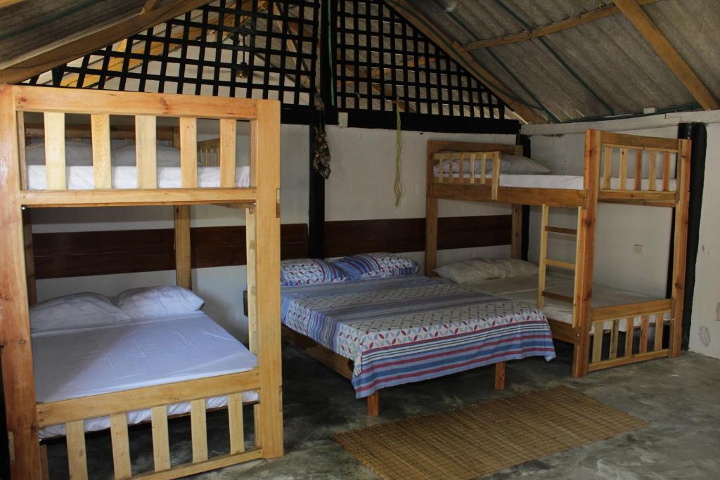 Postel nebo postele na pokoji v ubytování Yaharo Posada Turística