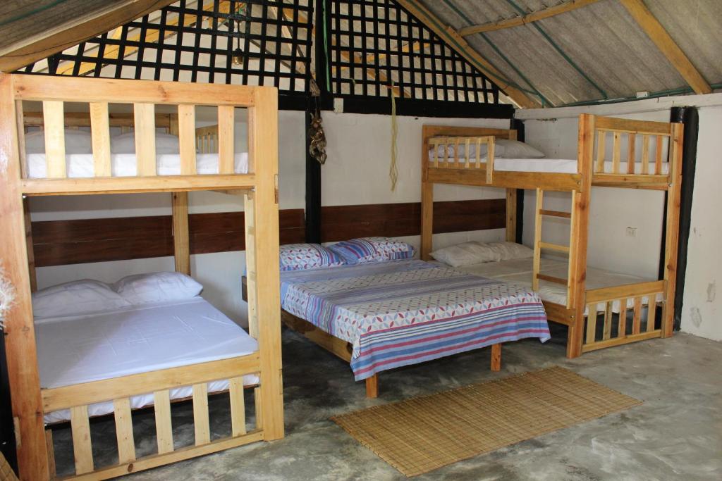 Postel nebo postele na pokoji v ubytování Yaharo Posada Turística