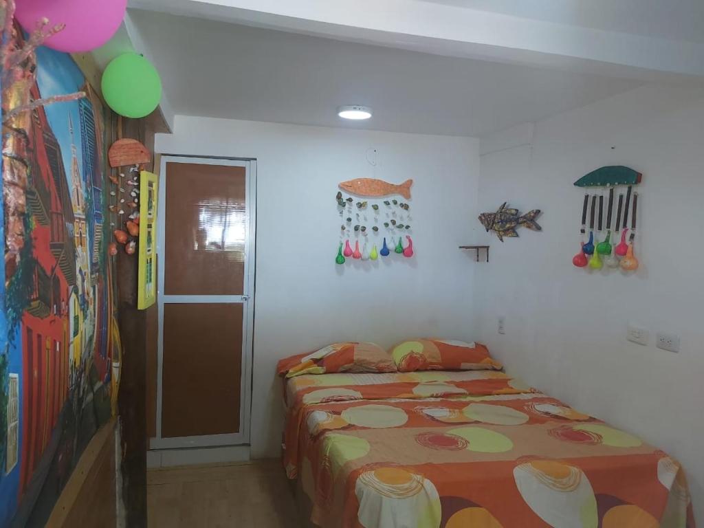 Ένα ή περισσότερα κρεβάτια σε δωμάτιο στο CABAÑA MIRADOR DE LA BOQUILLA