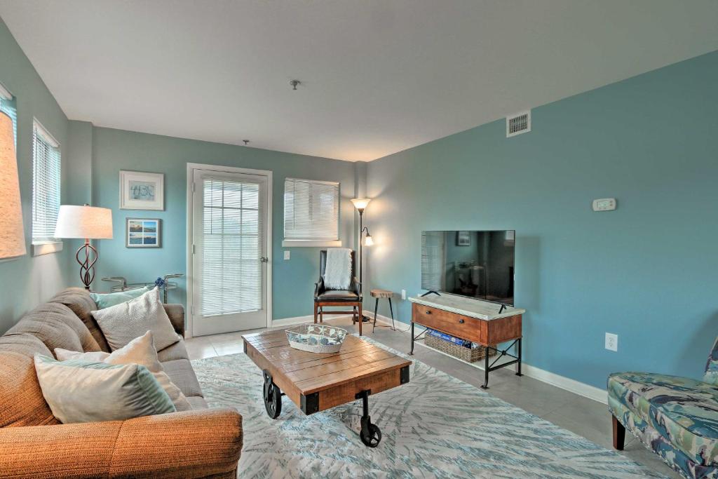 a living room with a couch and a table at Unit Nestled in Beachfront Hilton Head Resort in Hilton Head Island
