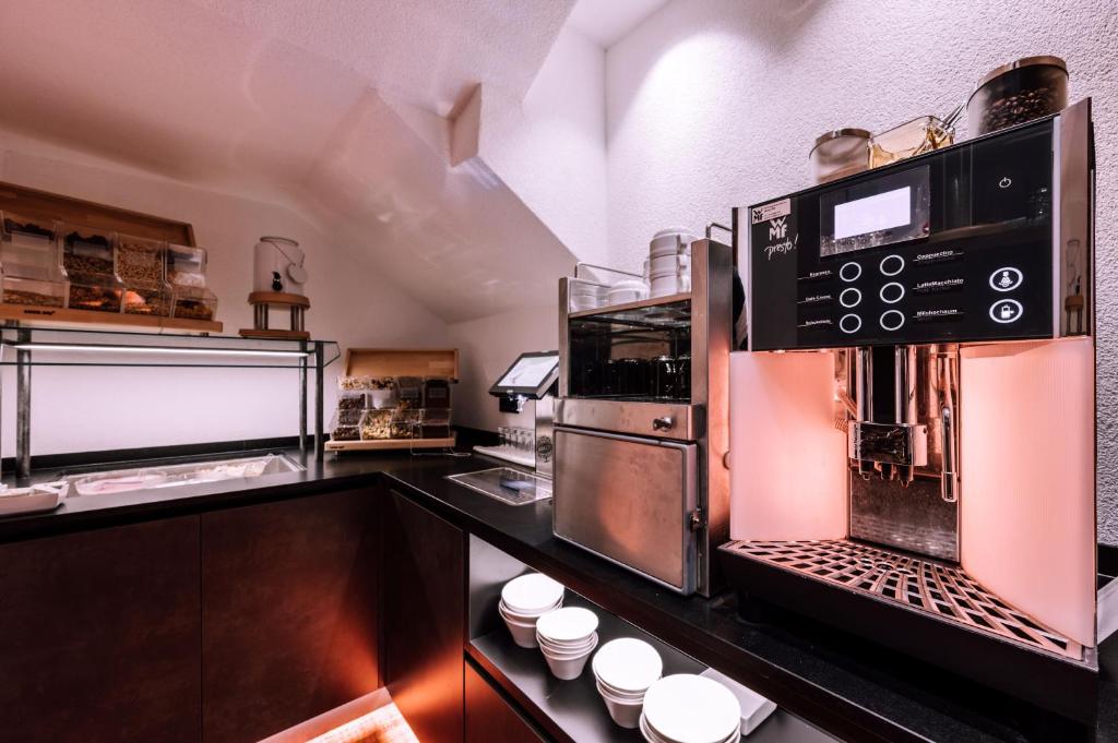 Kuchyň nebo kuchyňský kout v ubytování Hotel Grieserin