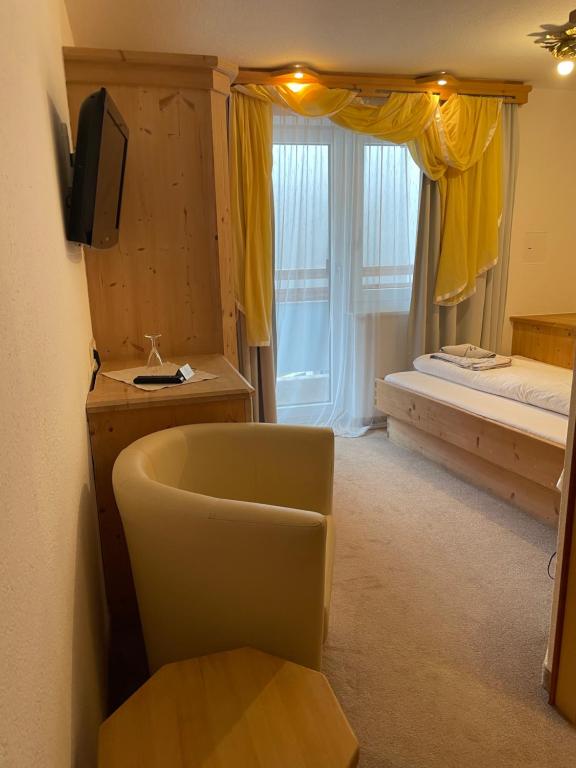 TV a/nebo společenská místnost v ubytování Hotel Grieserin