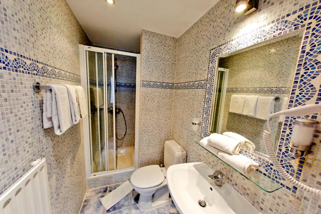 Koupelna v ubytování Hotel Midi-Zuid