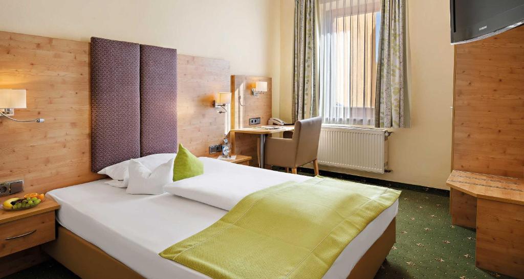 Postel nebo postele na pokoji v ubytování Hotel Liebl