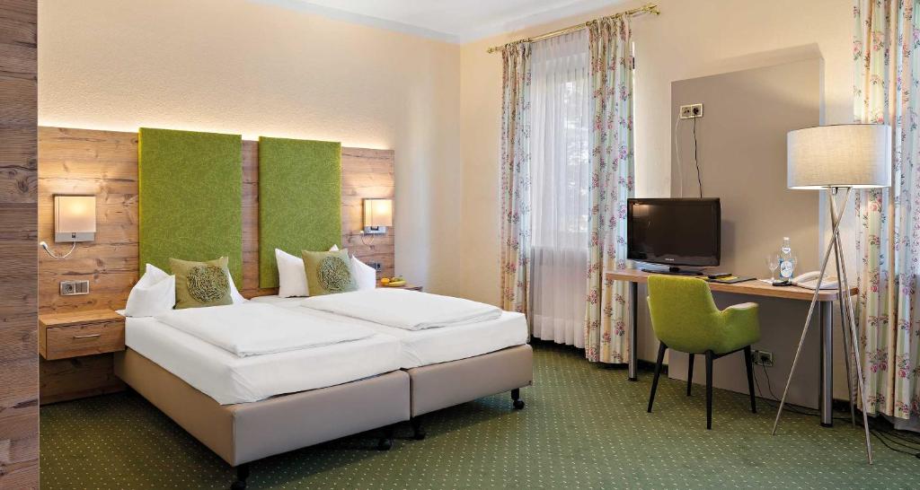 Postel nebo postele na pokoji v ubytování Hotel Liebl