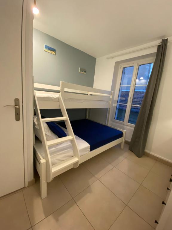 Postel nebo postele na pokoji v ubytování Albiréo, appt cosy en front de mer