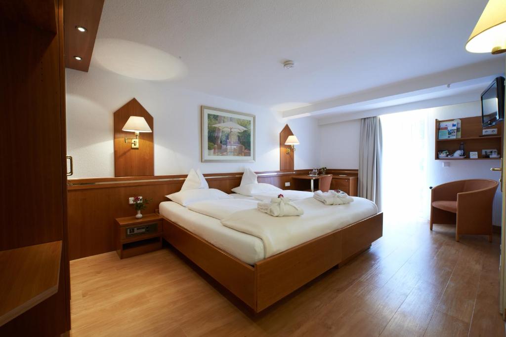 Postel nebo postele na pokoji v ubytování Hotel Klughardt