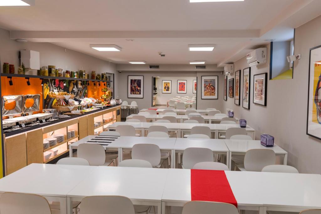 Reštaurácia alebo iné gastronomické zariadenie v ubytovaní B&B Julinek Park