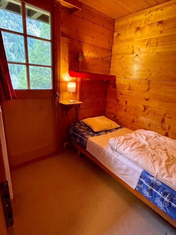 Postel nebo postele na pokoji v ubytování Chalet Singlinaz