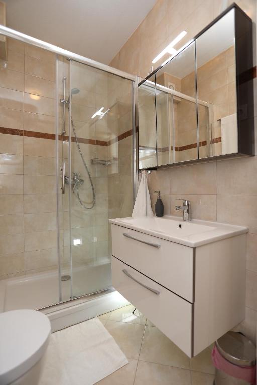 Kúpeľňa v ubytovaní Apartmani Kolak