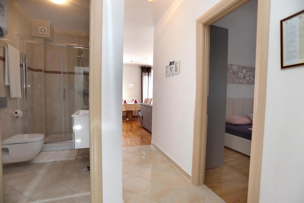 Kúpeľňa v ubytovaní Apartmani Kolak