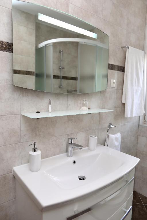 Kúpeľňa v ubytovaní Apartmani Kolak