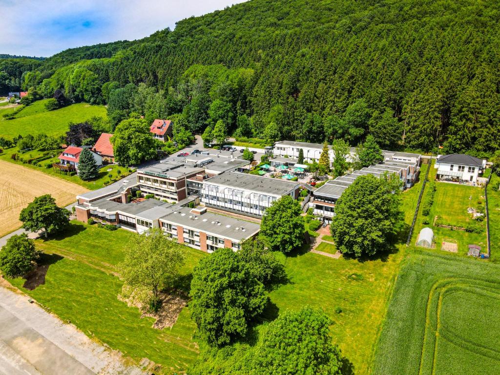 an aerial view of a building in the mountains at Hotel Wiehen-Therme in Hüllhorst