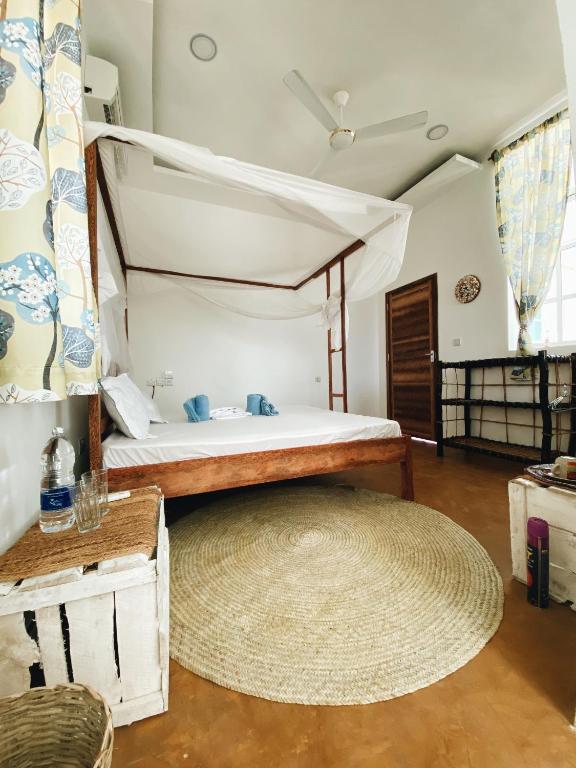 Postel nebo postele na pokoji v ubytování Crystal Beach Nungwi
