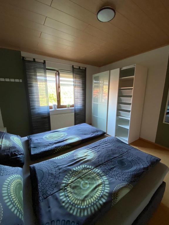 Postel nebo postele na pokoji v ubytování Ferienwohnung Jenny Edersee