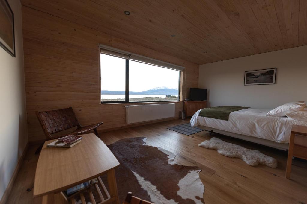 Postel nebo postele na pokoji v ubytování Line Hotel Patagonia