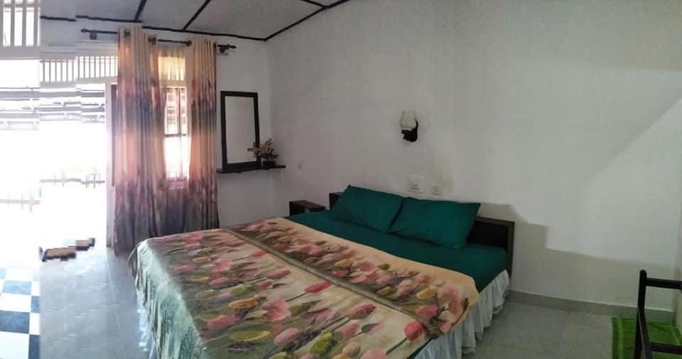 Postel nebo postele na pokoji v ubytování Sea Shine Guest House