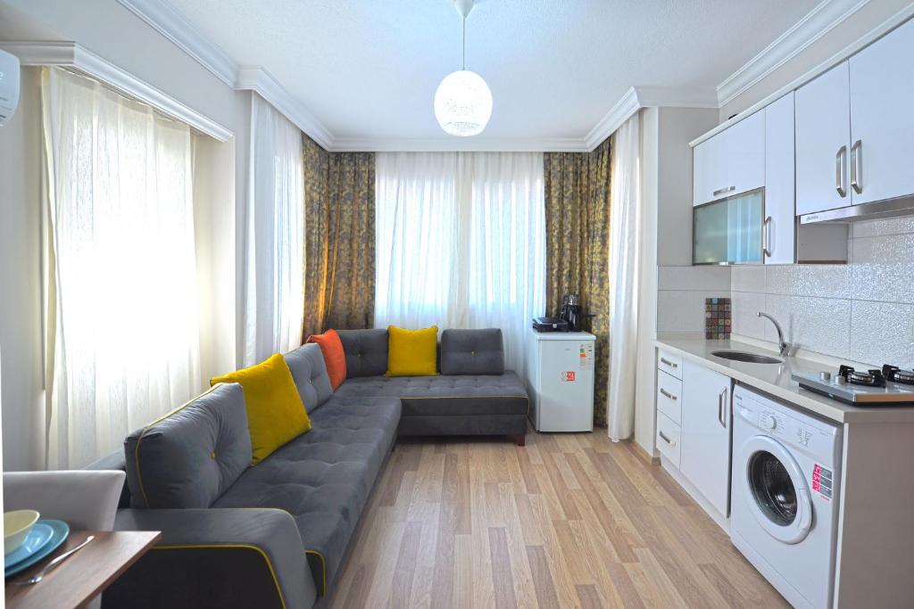 Kuchyň nebo kuchyňský kout v ubytování Ozgur City Residence