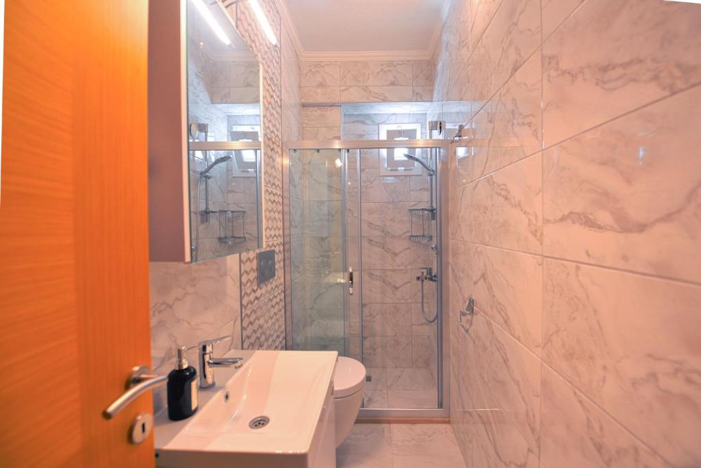 Koupelna v ubytování Ozgur City Residence