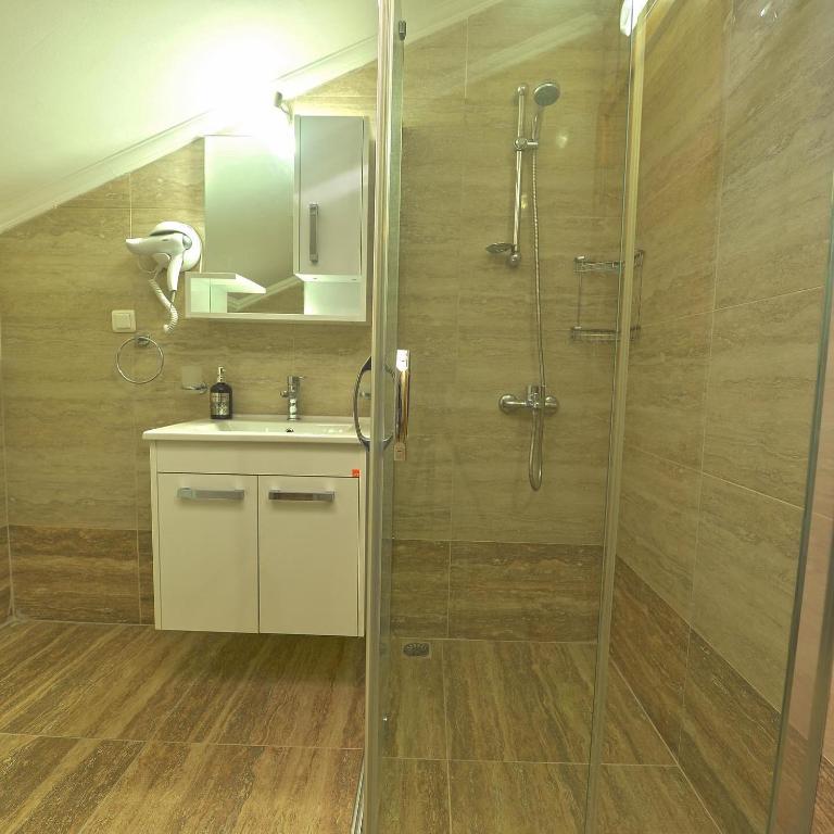 Koupelna v ubytování Ozgur City Residence