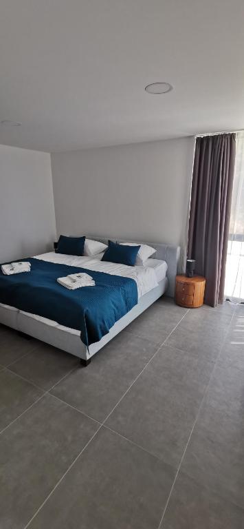 Postel nebo postele na pokoji v ubytování Sea House Resort