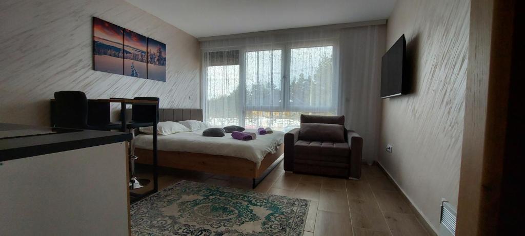 Postel nebo postele na pokoji v ubytování Sumski san 2