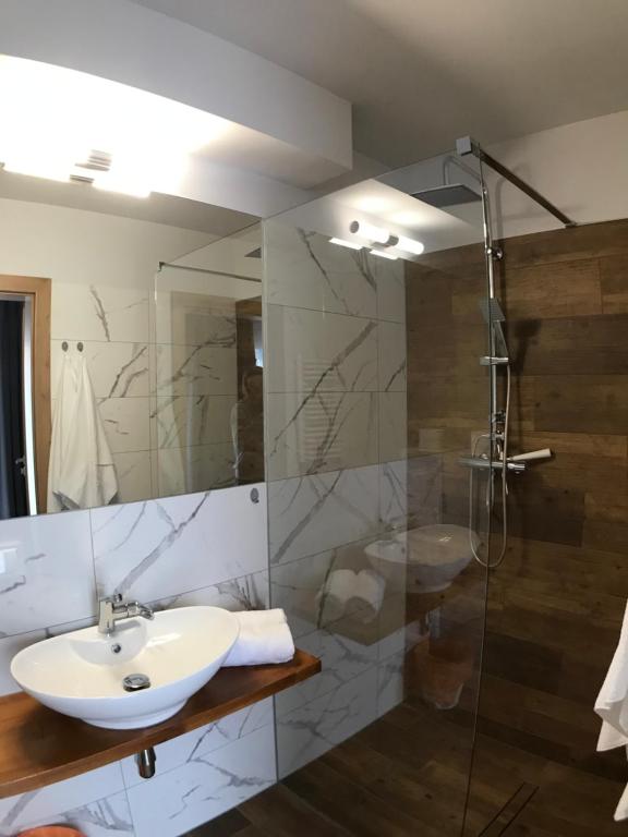 Kúpeľňa v ubytovaní Apartamenty Julia APARTAMENTY OZONOWANE