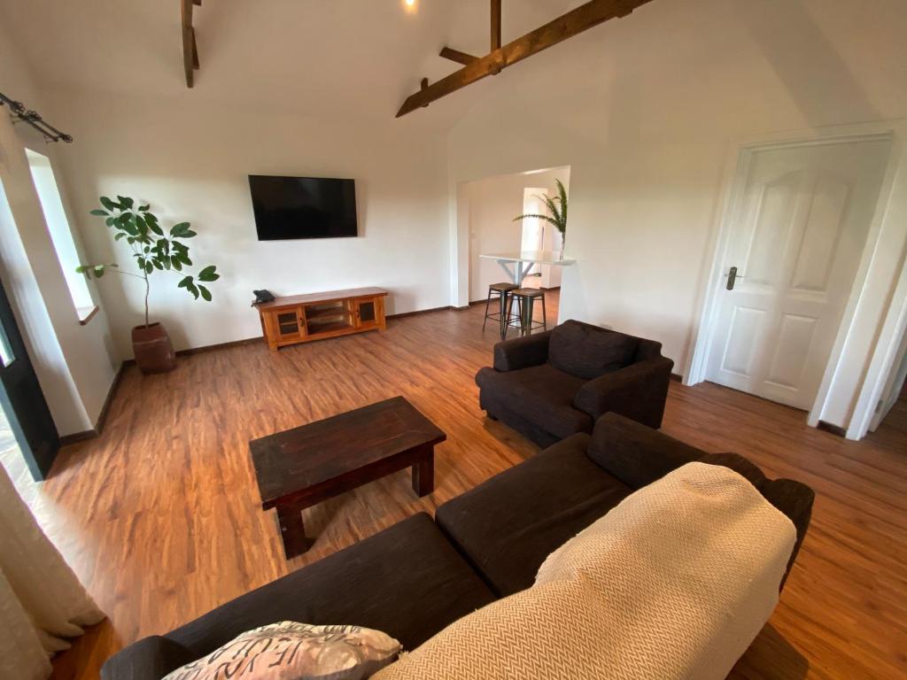 TV a/nebo společenská místnost v ubytování The Cabin