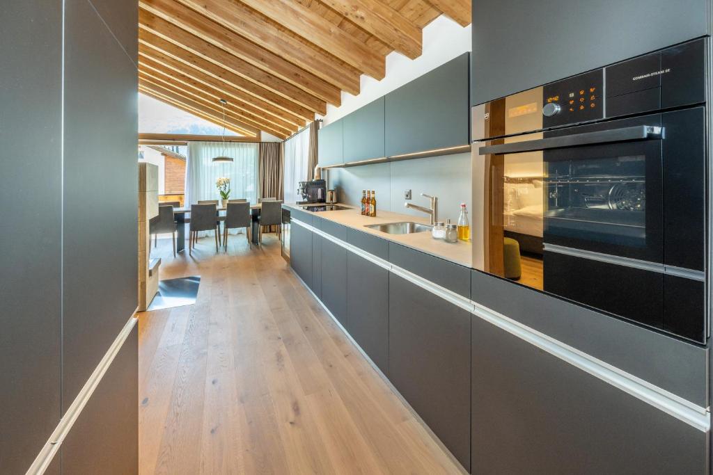 Kuchyň nebo kuchyňský kout v ubytování Luxury Residence Colosseo Zermatt