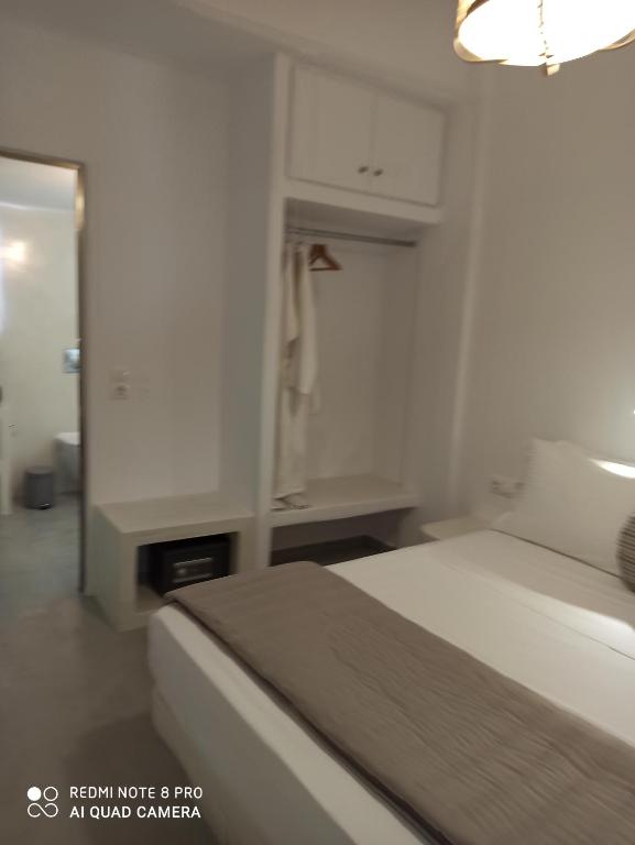 Postel nebo postele na pokoji v ubytování Kleri's apartments 4