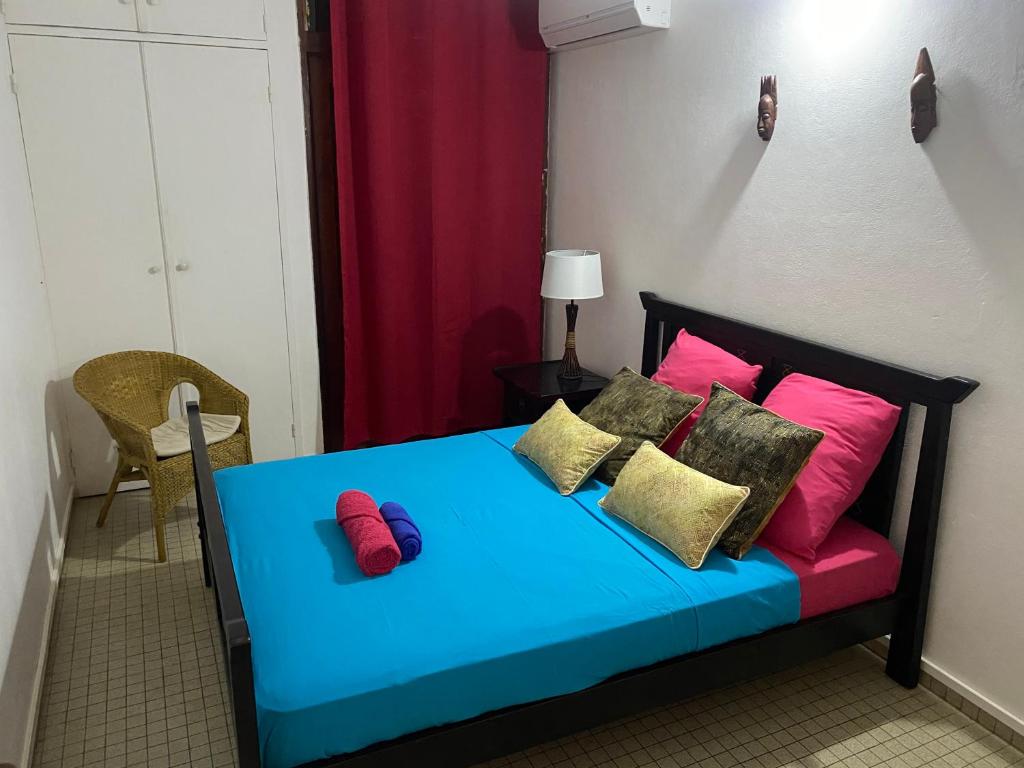 Postel nebo postele na pokoji v ubytování Maison Petit Paradis