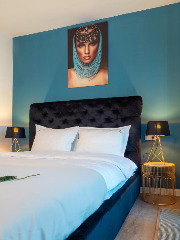 Postel nebo postele na pokoji v ubytování Signature Aparthotel - Boutique