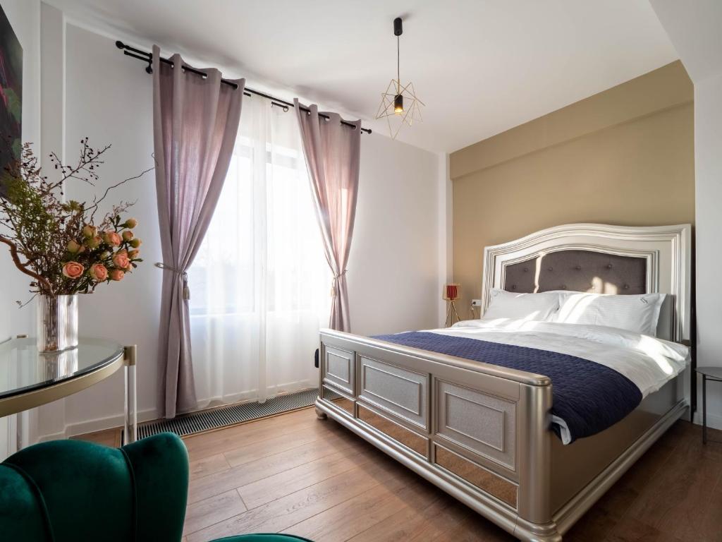 Postel nebo postele na pokoji v ubytování Signature Aparthotel - Boutique